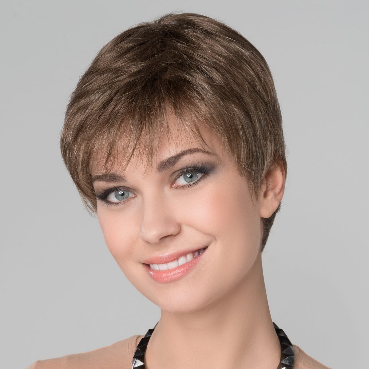 Liza Small | A monofilament top to give the impression of natural hair growth and parting versatility.