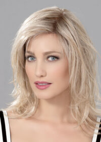 INTEREST |  A hand-tied lace part and front add a more natural appearance compared to other, similar wigs.
