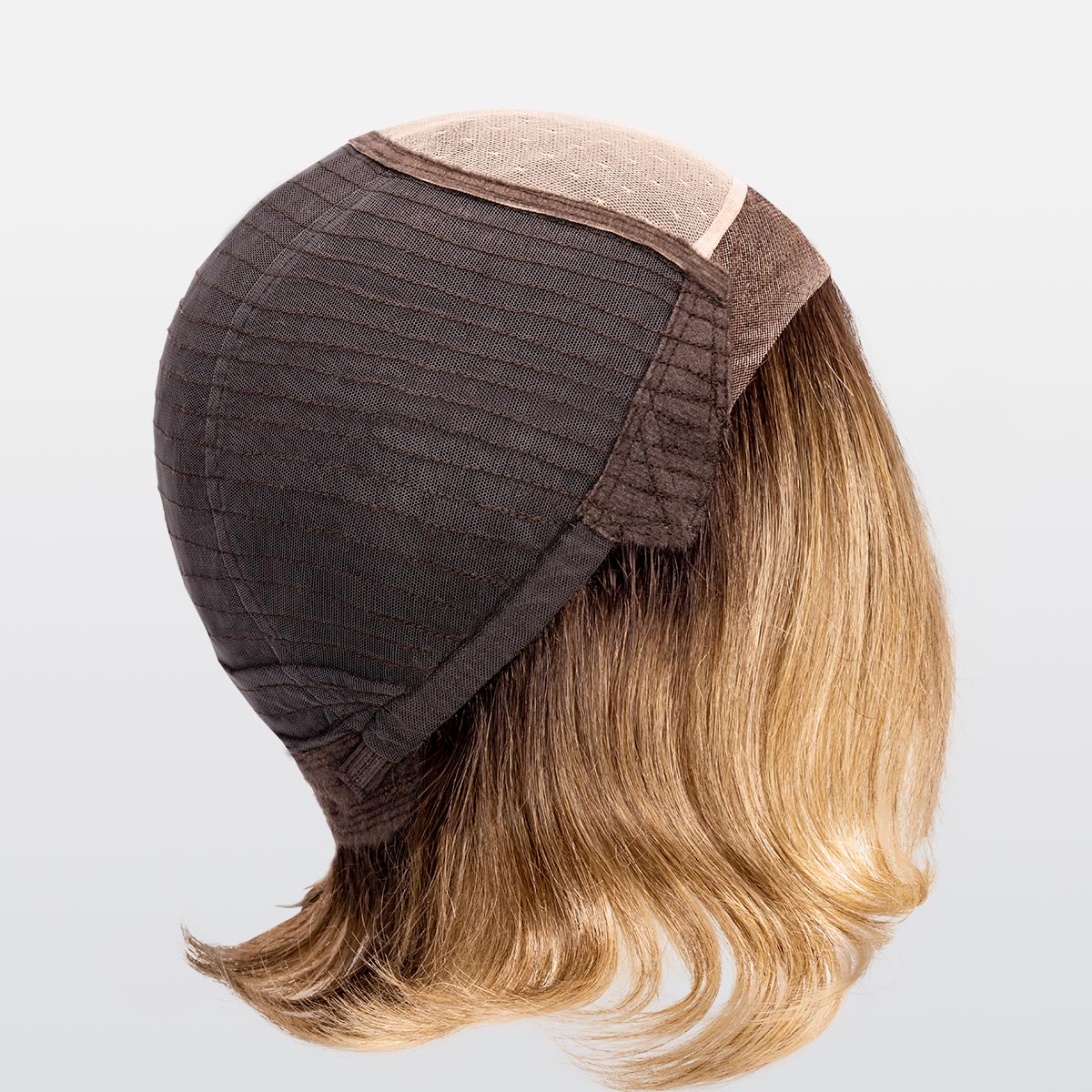 elegance-cap-sid: wig consists mostly of a wefted cap in which the hair is artfully sewn on fine cotton tapes.